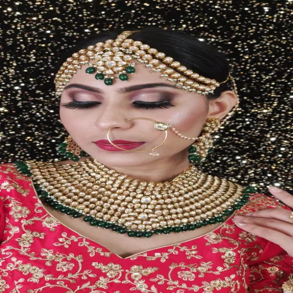 Kundan Green and gold jewellery set on rent