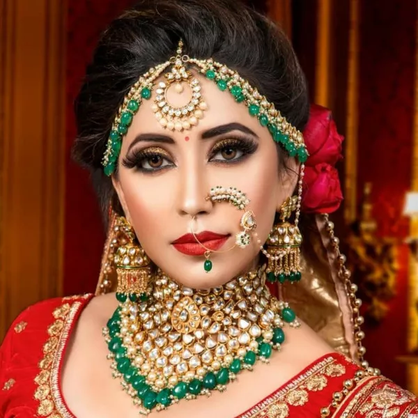 Bottle Green and gold Kundan jewellery set on rent